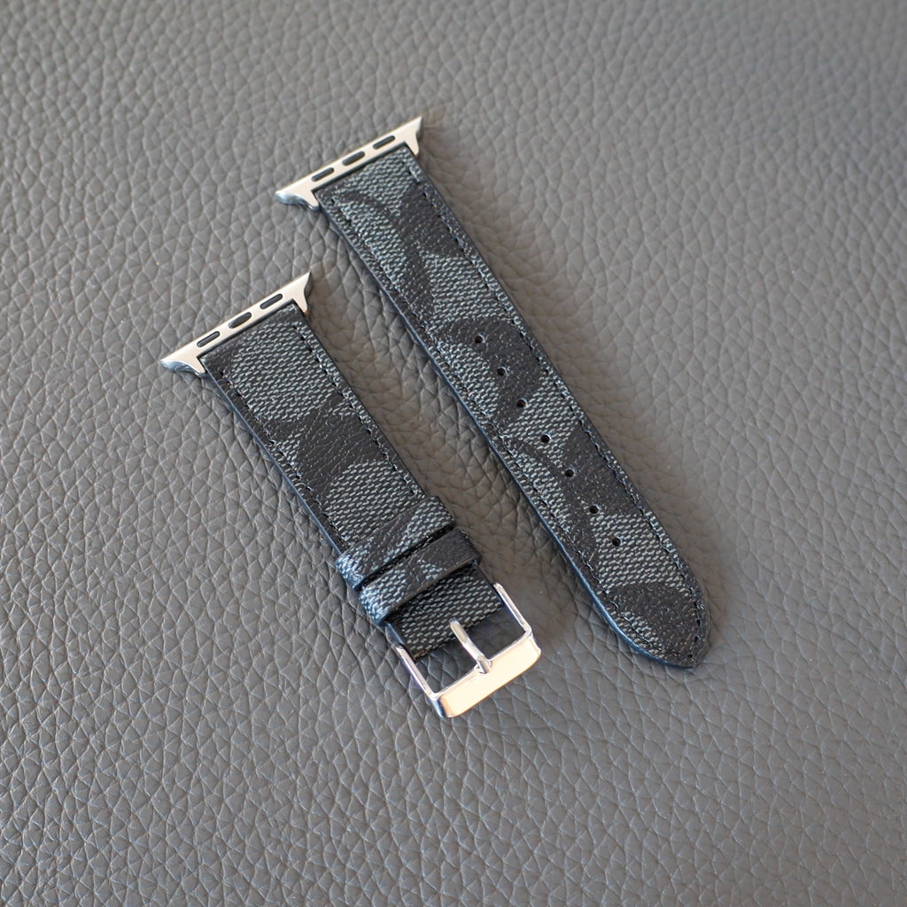 Black patterned Apple Watch band with silver connectors