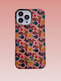 Multicolor floral iPhone case with a gold-tone central emblem