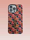 Pink floral iPhone case with a gold-tone monogram emblem