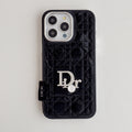 Black quilted iPhone case with a back grip tab and silver-tone emblem