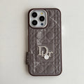 Taupe quilted iPhone case with a back grip tab and silver-tone emblem