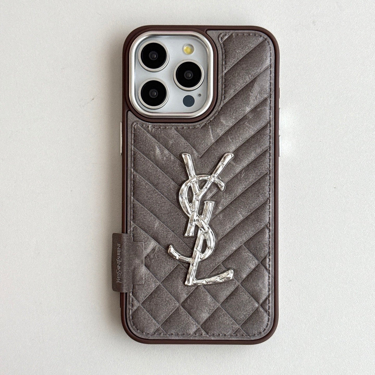 Taupe quilted iPhone case with a back grip tab and silver-tone initials