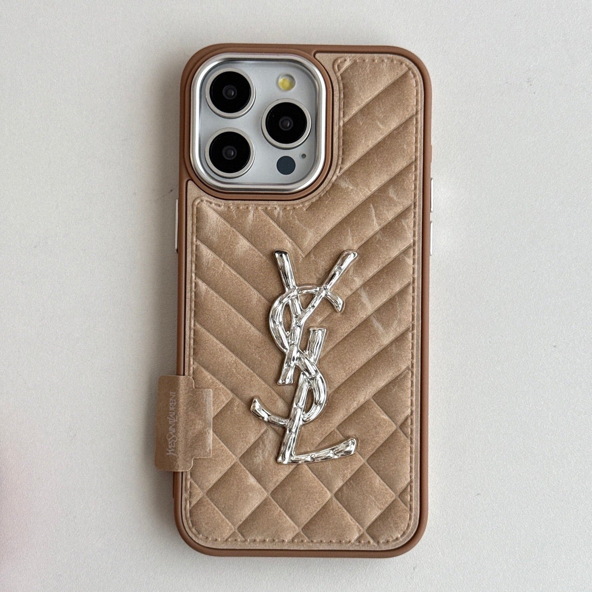 Champagne quilted iPhone case with silver-tone monogram initials