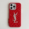 Red quilted iPhone case with a back grip tab and silver-tone initials