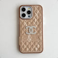 Champagne quilted iPhone case with a silver-tone emblem