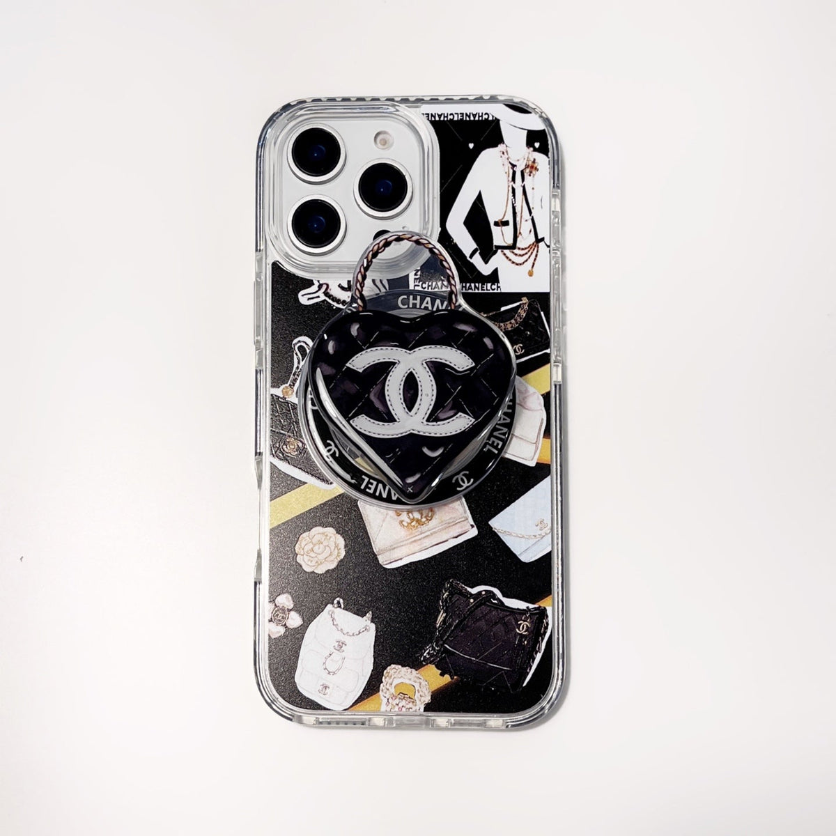 Black and white fashion collage iPhone case with a heart-shaped centerpiece