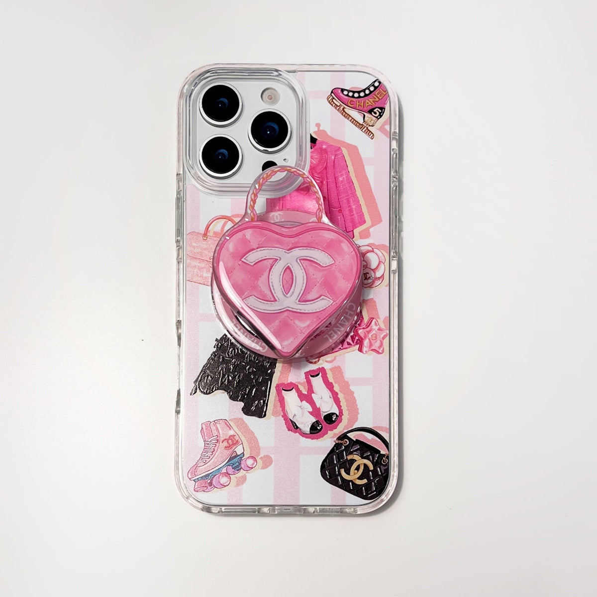 Clear pink collage iPhone case with a heart-shaped perfume graphic