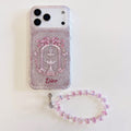 Pink glitter iPhone case with a perfume graphic and beaded wrist strap