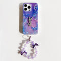 Purple and blue marble-effect iPhone case with a beaded butterfly wrist strap