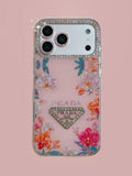 Clear pink floral iPhone case with a jeweled camera border
