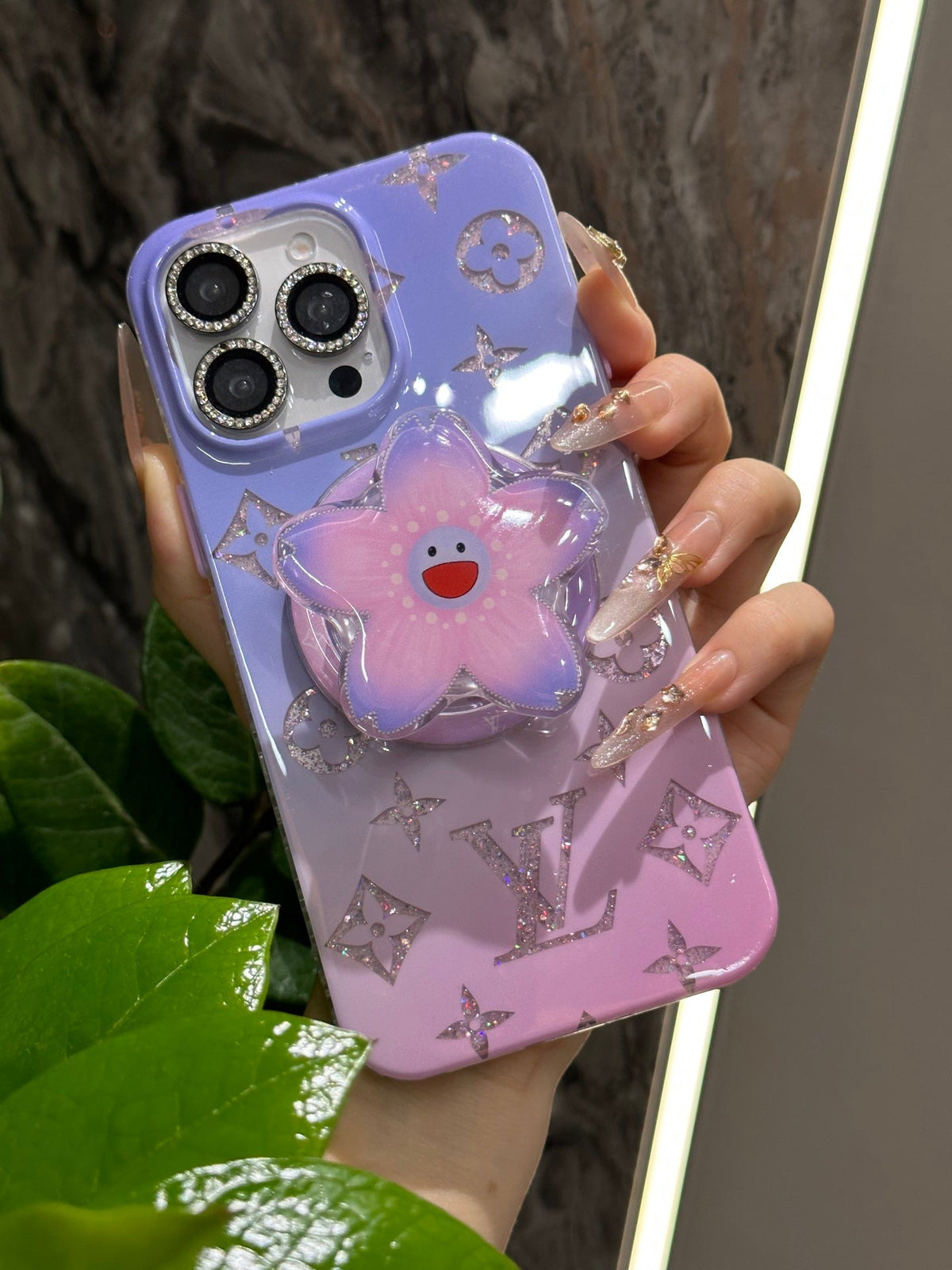 Lavender iPhone case with a three-dimensional cartoon flower grip