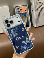 Dark blue butterfly and floral iPhone case with a jeweled camera border shown from another angle