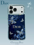 Dark blue butterfly and floral iPhone case with a jeweled camera border