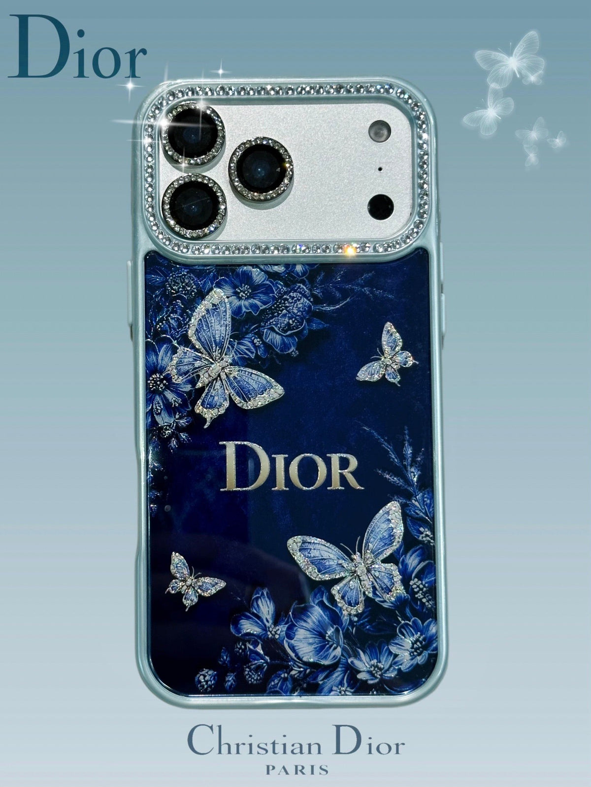 Dark blue butterfly and floral iPhone case with a jeweled camera border