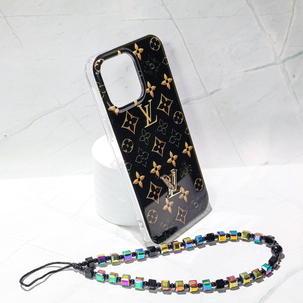 Black LV golden monogram iPhone case showing the camera area and protective corners