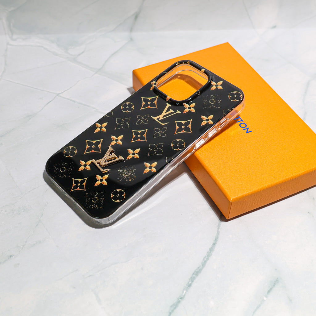 Black LV iPhone case with golden monogram showing the dark patterned back and camera opening