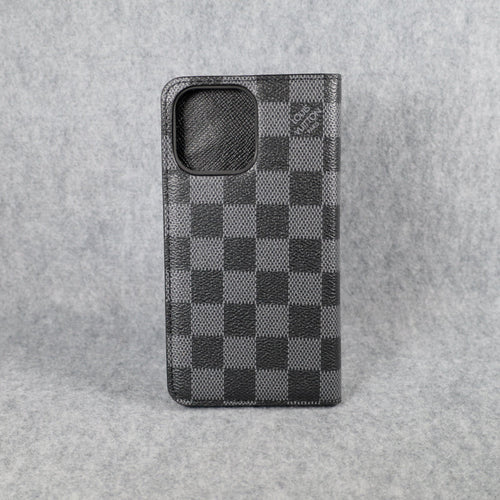 Black LV iPhone wallet case back view showing the dark leather folding cover