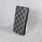 Black LV iPhone wallet case showing the folding leather design and protective edges