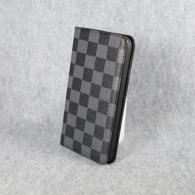 Black LV iPhone wallet case showing the folding leather design and protective edges