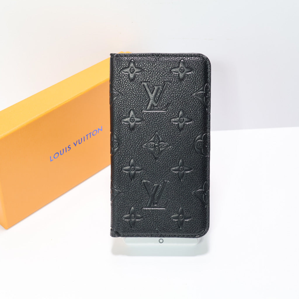 Detailed view of the black LV wallet iPhone case showing the rear finish and card holder