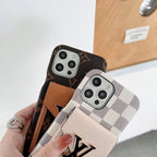 Close-up of the LV iPhone card slot case showing leather texture and wallet detail