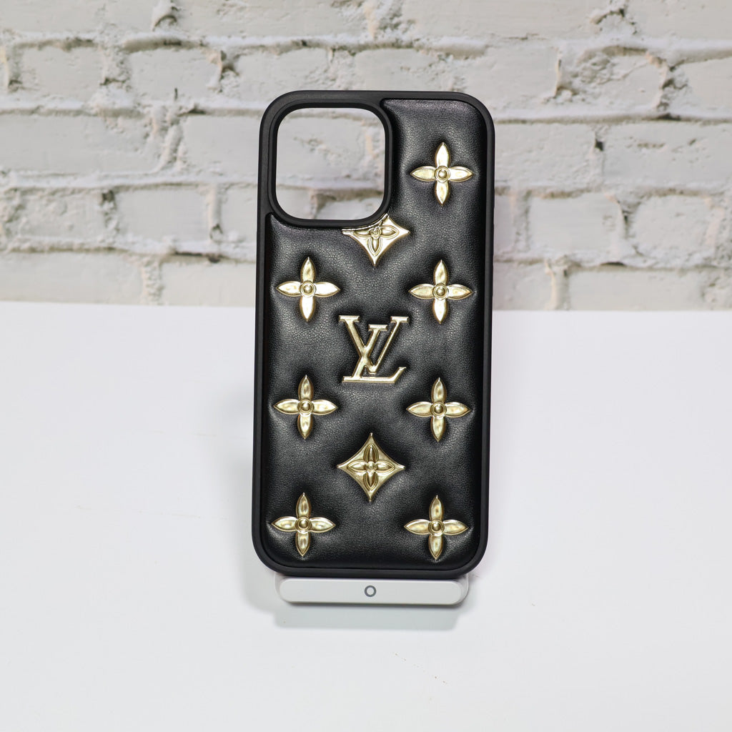 Close-up of the luxury LV iPhone case showing material texture and protective corners