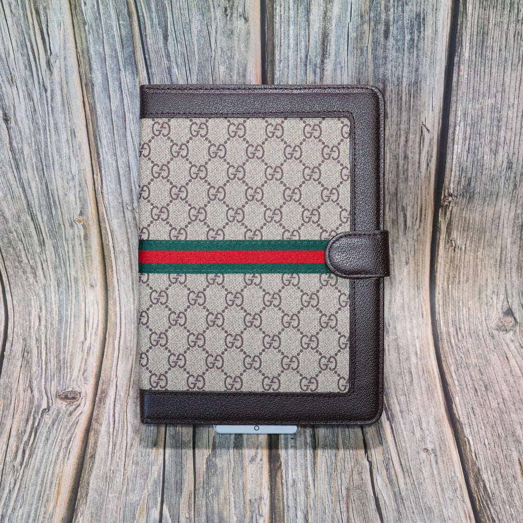 GG iPad case with kickstand showing the folio cover and patterned material finish