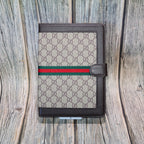 GG iPad case with kickstand showing the folio cover and patterned material finish