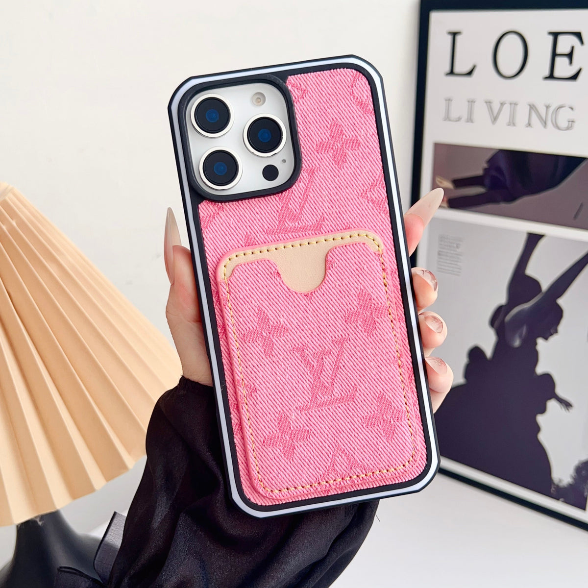 Pink fabric LV iPhone card slot case showing the textured back cover and card holder