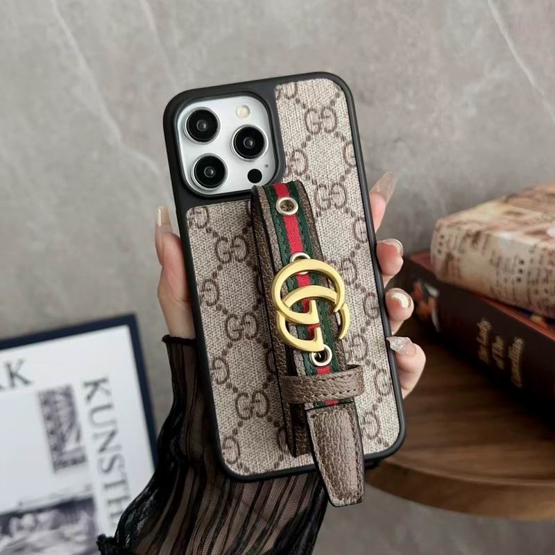 Beige GG style iPhone case with adjustable hand strap and kickstand function