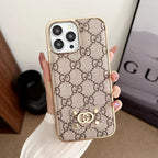 Beige GG style electroplated iPhone case showing the patterned leather back and slim frame