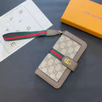 Beige GG style iPhone wallet case showing the folding cover and card holder design