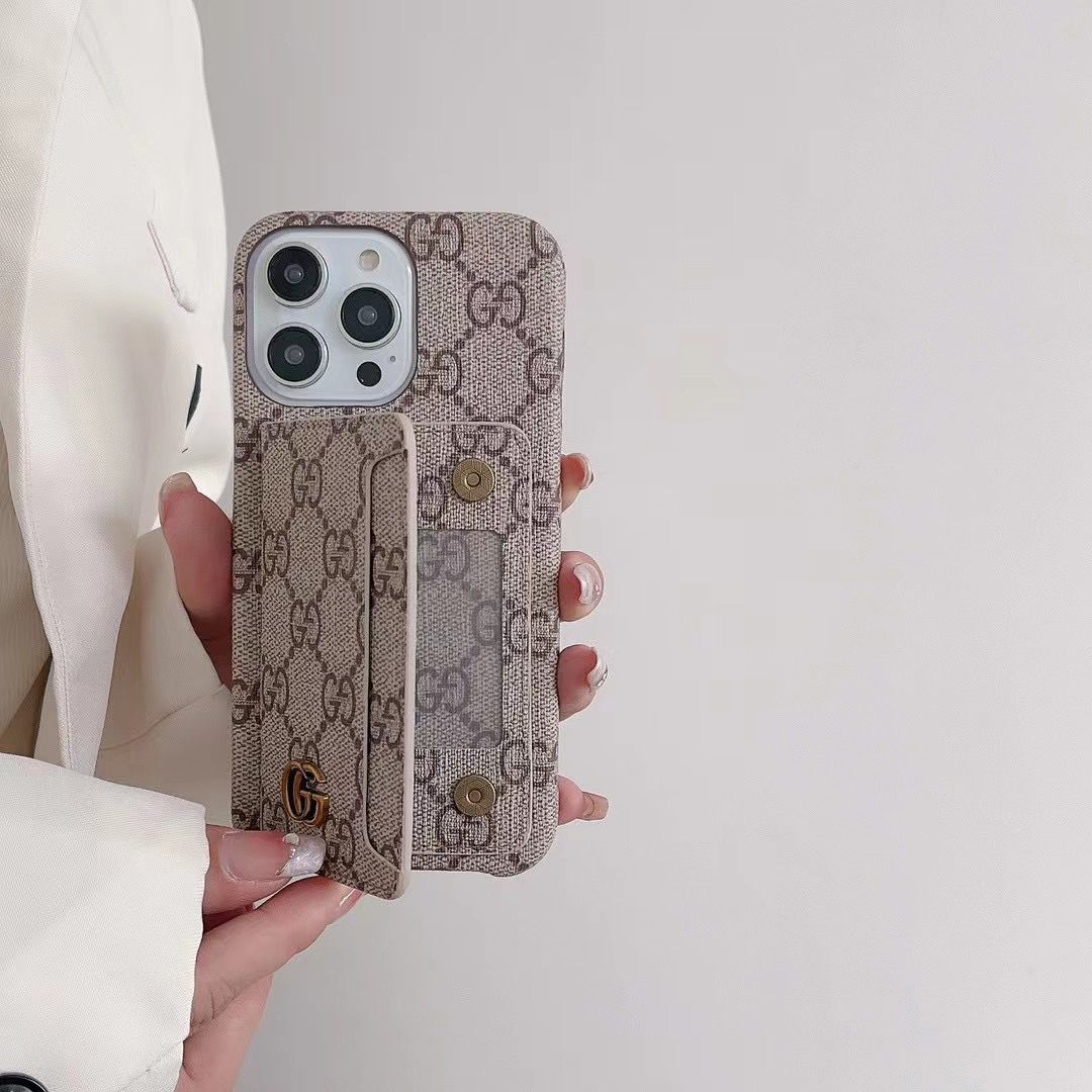 GG style iPhone card slot case showing the patterned wallet cover and camera opening