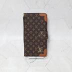 LV folio wallet iPhone case with edge patches showing the folding cover and card holder area