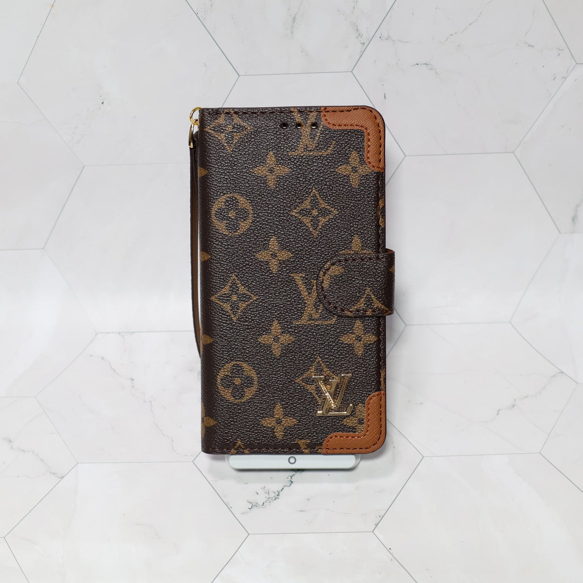 LV folio wallet iPhone case with edge patches showing the complete wallet-style protective design