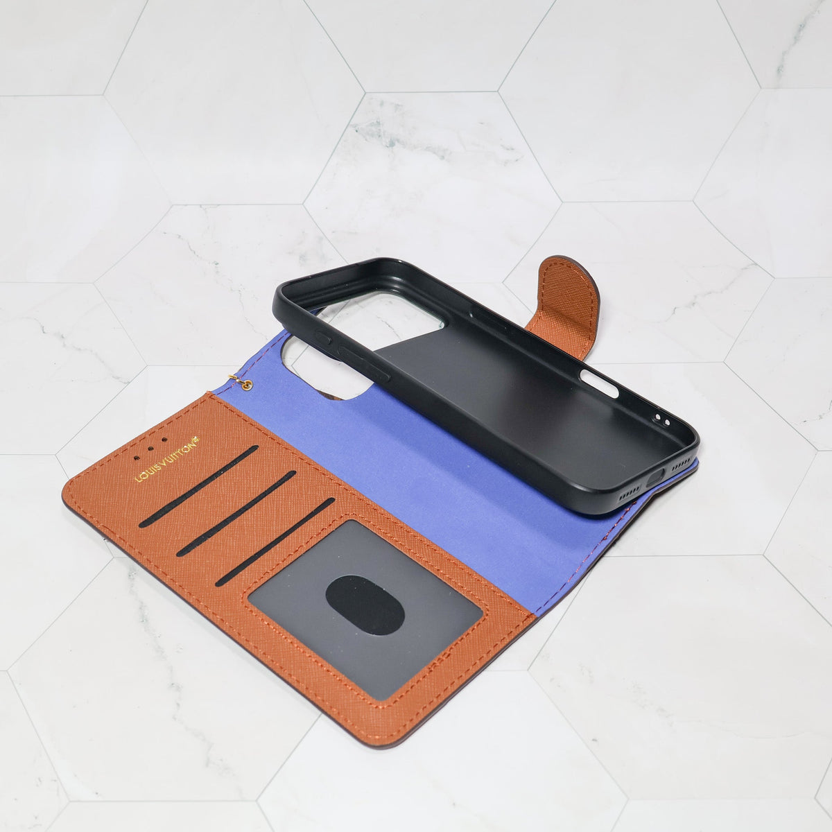 LV folio wallet iPhone case with edge patches showing the folding wallet construction and camera opening