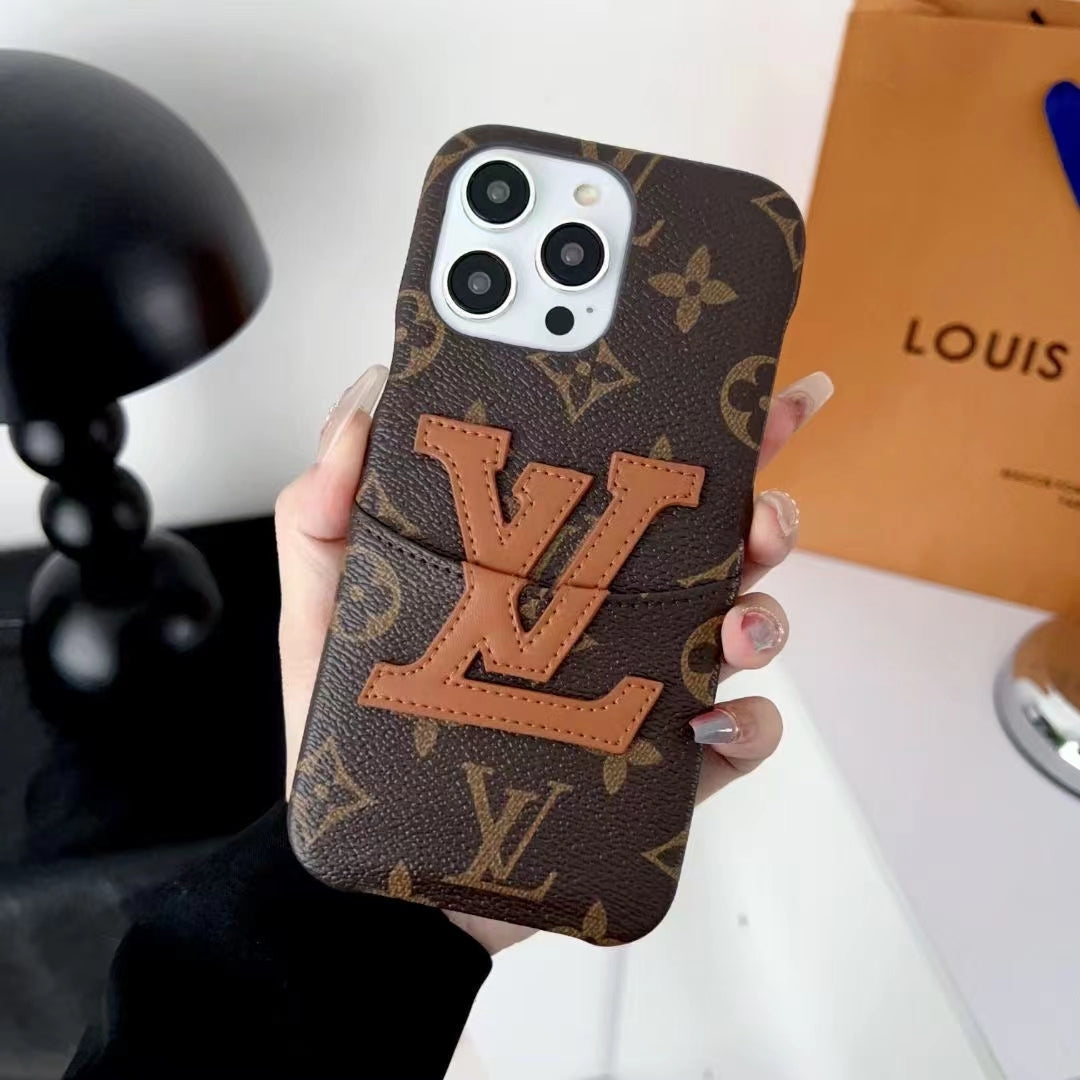 Close-up of the LV iPhone card slot case showing the wallet detail and back design