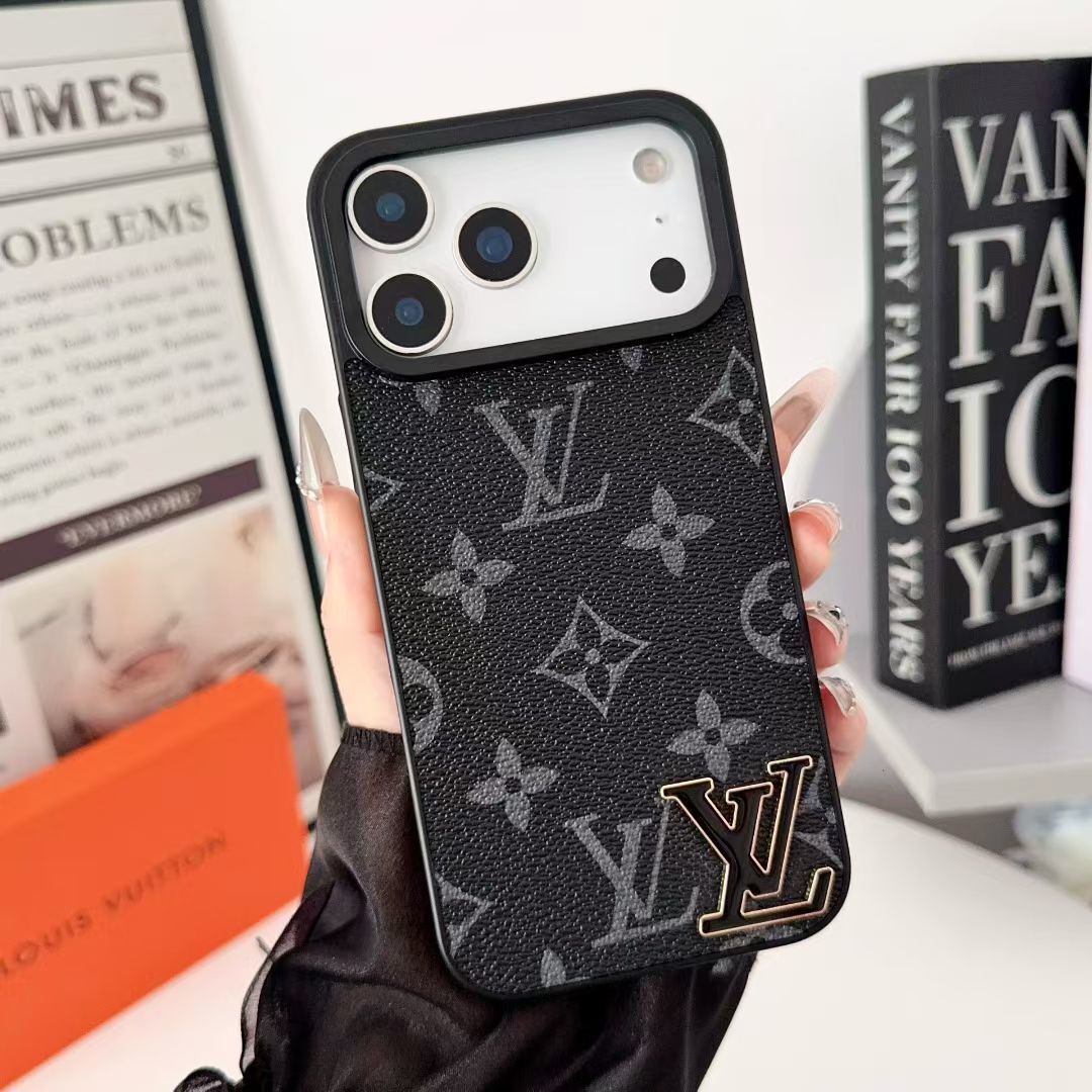 Black monogram LV iPhone case showing the dark patterned rear cover and camera opening
