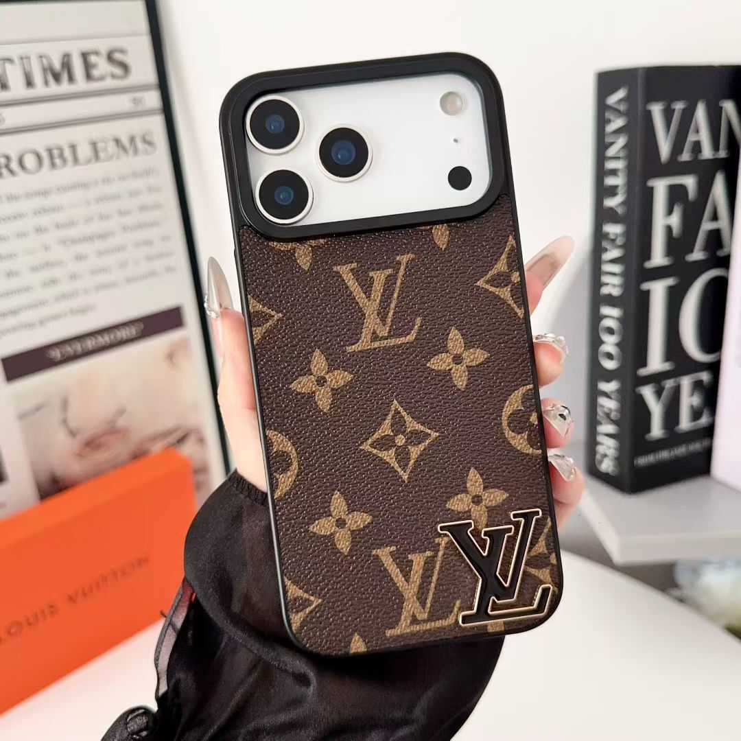 Brown monogram LV iPhone case showing the leather-patterned rear design and camera area