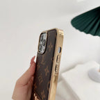 Electroplated iPhone case side view showing metallic edge protection and fitted buttons