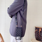 Classic monogram LV crossbody iPhone case shown with the carrying strap and patterned rear cover