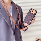 Classic monogram LV crossbody iPhone case showing the slim profile and leather finish