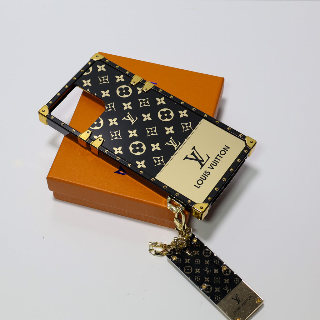 Golden Eye Trunk iPhone case shown from the rear with the monogram design and camera cutout