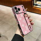 Close-up of the hand strap iPhone case showing the patterned back and comfortable grip