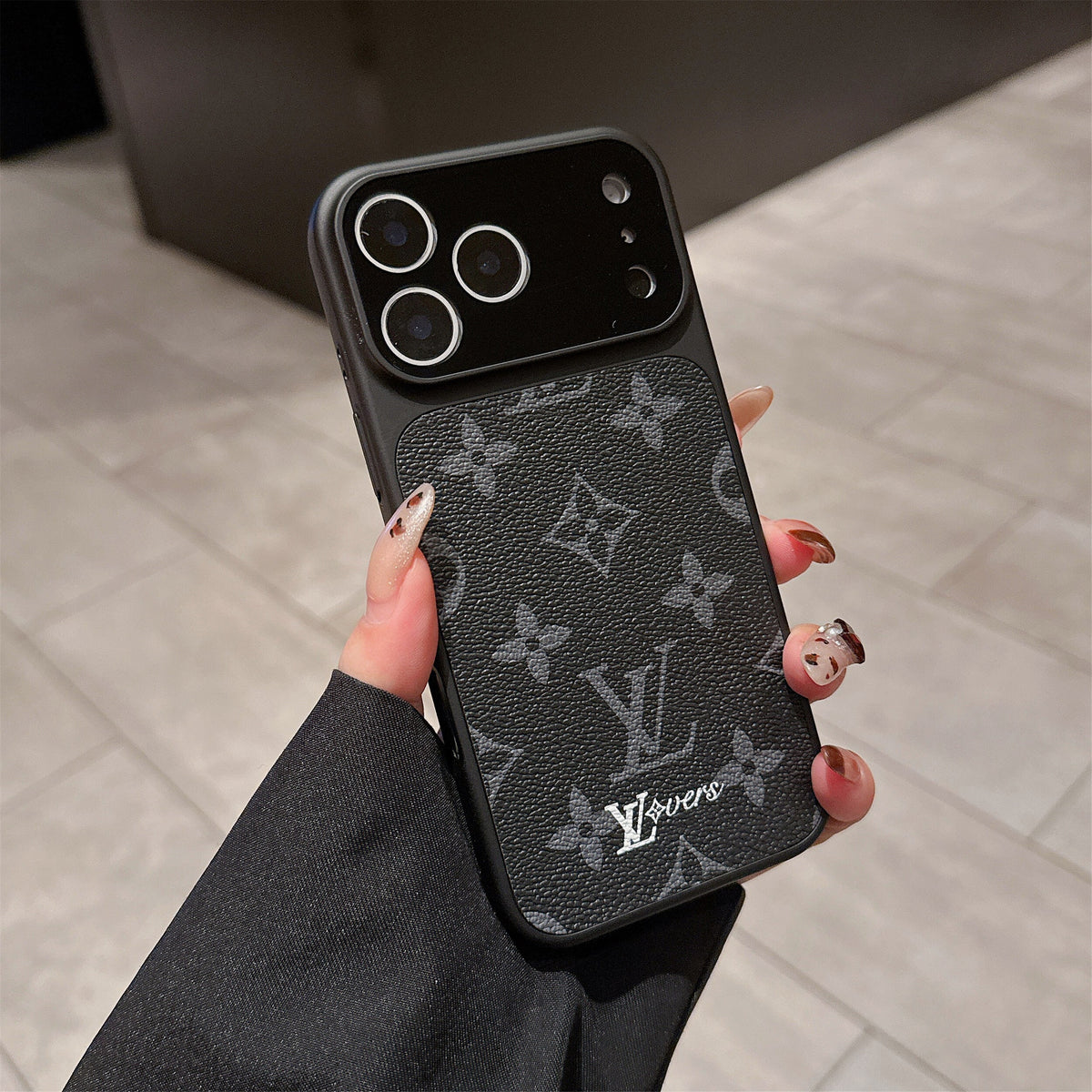 LV lens protection iPhone case showing the protective camera opening and finished edges