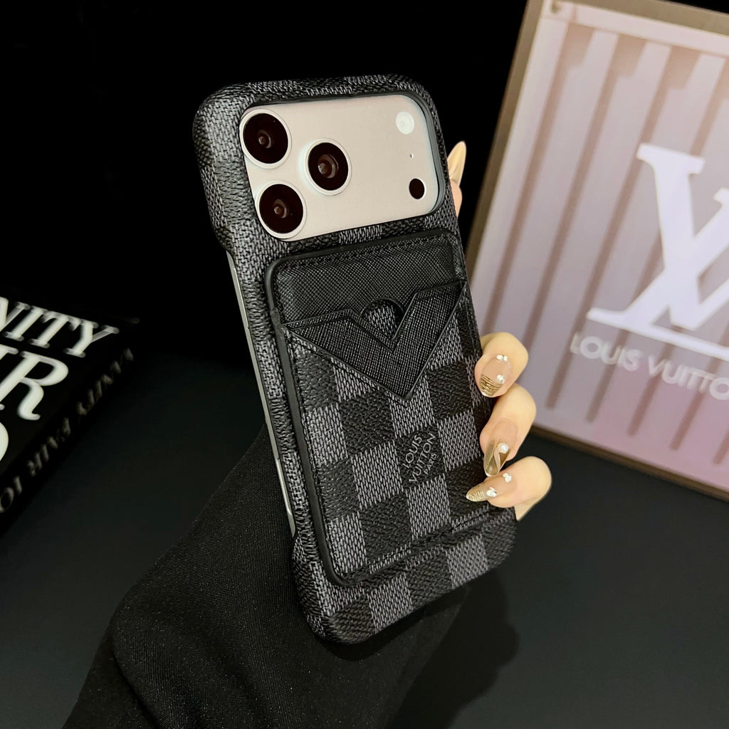 Close-up of the LV magnetic card holder phone case showing the wallet feature and leather texture