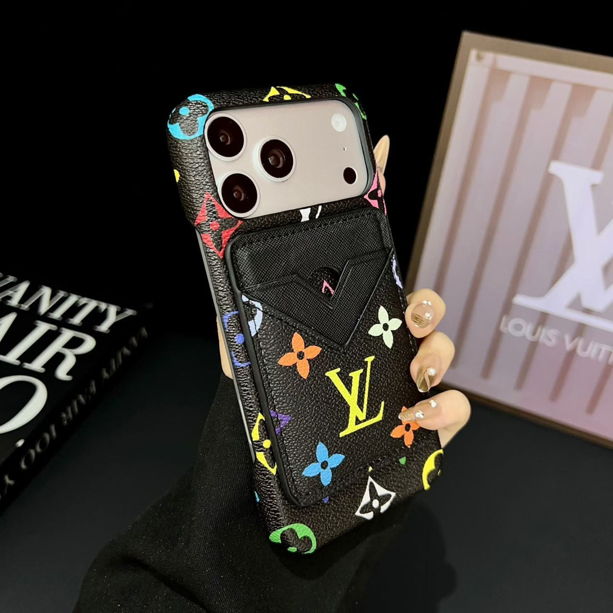 LV MagSafe iPhone case with magnetic card holder showing the fitted protective cover