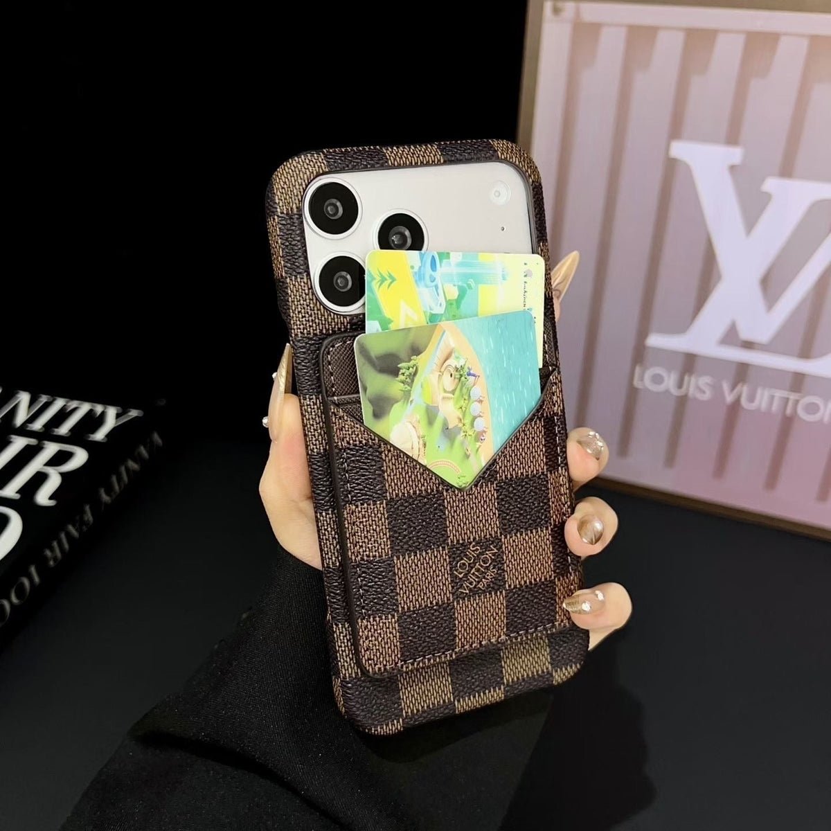 Close-up of the magnetic wallet iPhone case highlighting the card holder and camera opening