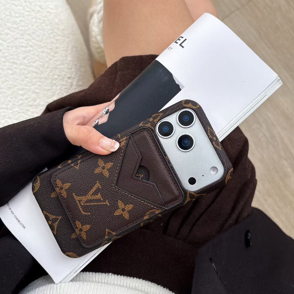LV MagSafe card holder phone case showing the patterned back and magnetic wallet feature