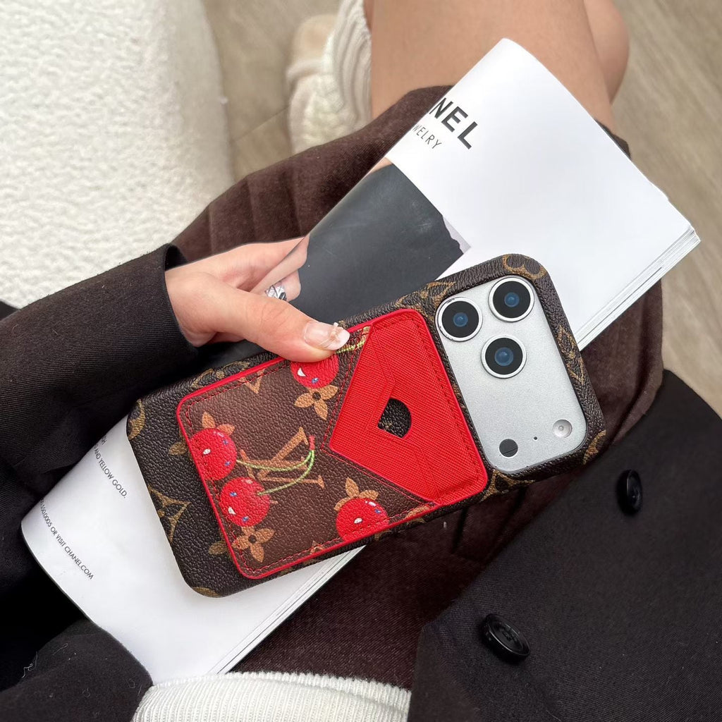 LV magnetic wallet iPhone case showing the card holder attachment and patterned cover